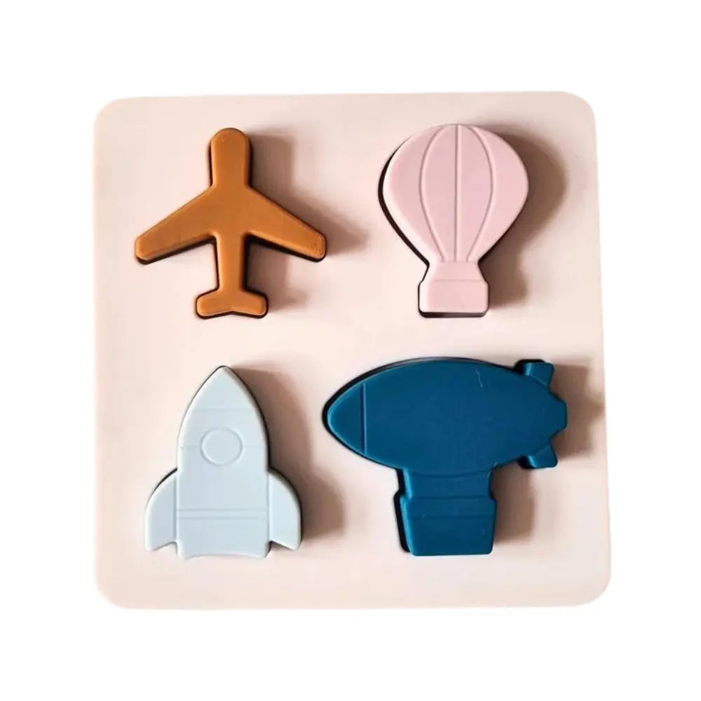 Puzzle en silicone avec des formes de moyen de transport aériens 